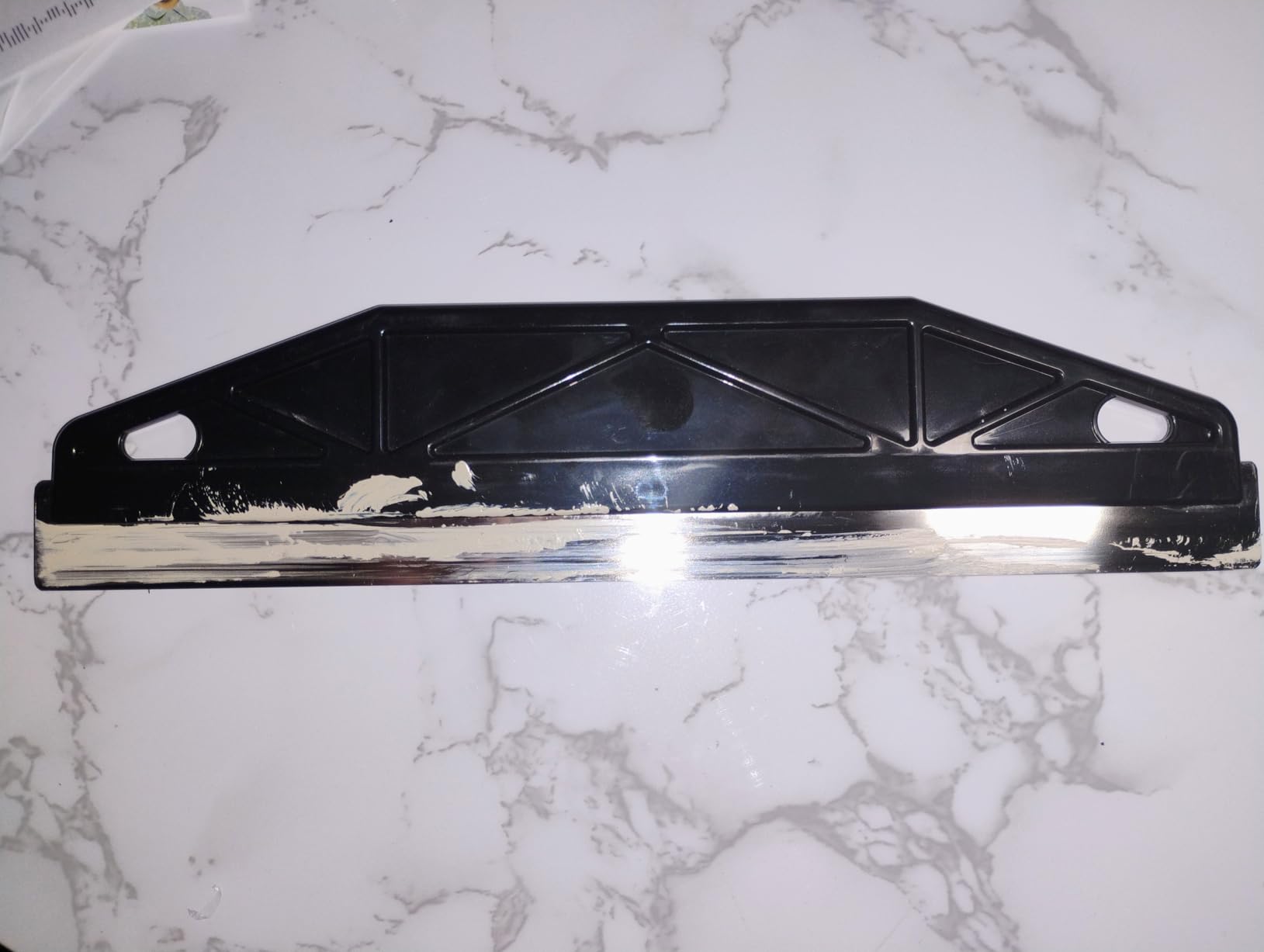 Paint trim guard used for clean wall edges and baseboard painting