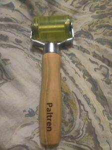 Paltren pressure roller with compact seam-rolling wheel