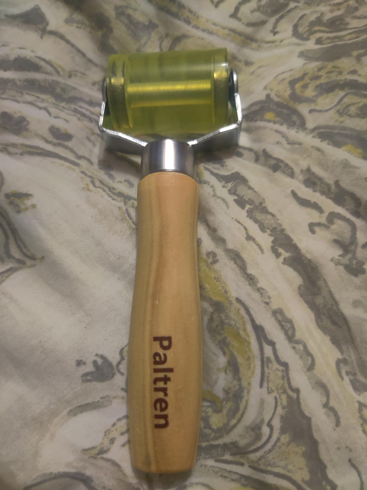 Paltren pressure roller with compact seam-rolling wheel